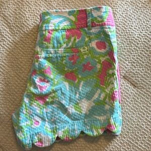 Lilly Putzer scalloped shorts. Floral color.